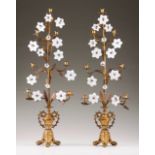 A pair of girandoles Gilt metal With seven lights and decorated with branches and milk glass flowers