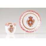 A cup and saucer Chinese export porcelain Polychrome and gilt decoration depicting Portugal's coat-
