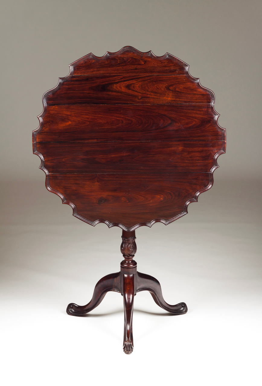 A scalloped tripod table Rosewood Carved decoration Tilt-top Portugal, 19th century 75x76 cm