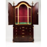An Empire style commode with oratory Mahogany veneered mahogany Oratory with door, gilt frame and