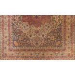 A Kerman carpet, Iran Cotton and wool Floral decoration in red, blue and beige 430x290 cm