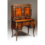 A Napoleon III Bonheur du jour Ebonized wood Marquetry decoration and gilt bronze mounts Upper