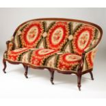 A Romantic settee Rosewood Upholstered seat, arms and back Portugal, late 19th, early 20th century