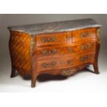 A Louis XVI commode Marquetry decoration Two long and two short drawers Gilt bronze mounts Marble