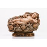 Lying Child Jesus Polychrome terracotta sculpture repesenting lying Child Jesus surrounded by