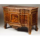 A Louis XVI style commode After a model by Jean-Henri Riesener Marquetry decoration representing