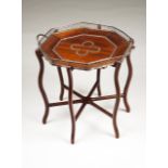 An octogonal tray Rosewood with silver mounts, feet, gallery and handles Decoration with quatrefoils