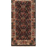 A Kashkai Carpet Cotton and wool Floral and geometric design in red, beige and brown 137x70 cm