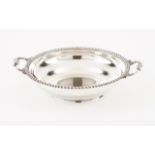 A bowl with two handles Portuguese silver Fluted rim, handles decorated in relief with volutes Porto