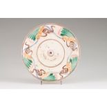 A plate Coimbra faience, known as "Ratinho", 19th century Vinous decoration and polychromed tab (