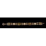 A bracelet Traditional gold Pierced and enamelled links Portuguese assay mark (1887-1937) and
