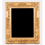 A wall mirror Carved and gilt wood frame France, 19th century 137x125 cm