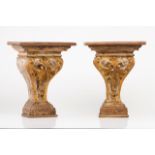 A set of four wall brackets Carved wood with traces of gilding and polychromy Decorated with shell