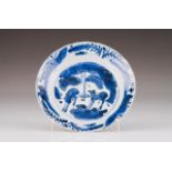 A scalloped plate Chinese porcelain Blue decoration depicting landscape with deers Tab