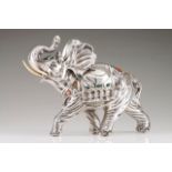 A large elephant, MANUEL ALCINO A Portuguese silver sculpture representing a richly equipped