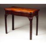 A George III style card table In the Chippendale taste Mahogany veneered mahogany Brown leather