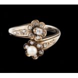 A gem-set ring White gold set with one cultured pearl, rose cut diamonds and 13 single cut