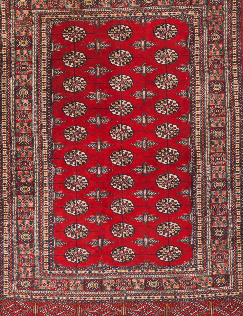 A Bokara carpet Cotton and wool Geometric decoration in red, beige and blue 180x130 cm