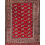 A Bokara carpet Cotton and wool Geometric decoration in red, beige and blue 180x130 cm