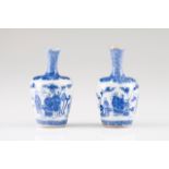 A pair of miniature vases Chinese porcelain Blue underglaze decoration depicting Oriental figures (