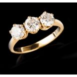 A diamond ring Set in gold with three brilliant cut diamonds (ca. 1,15ct) Portuguese assay mark (