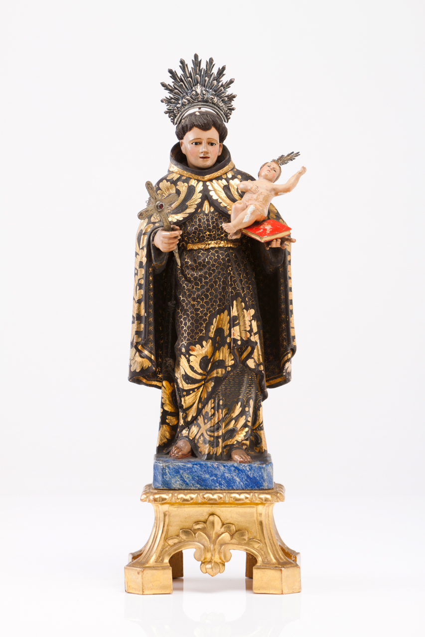 Saint Anthony with the Child Carved, polychrome and gilt wood sculpture Marbled base and carved