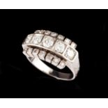 A Retro diamond ring Set in white gold with 14 single cut diamonds and five brilliant cut