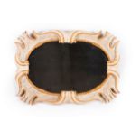 A pair of oval mirrors Marbled and gilt frames with carved decoration Italy, 18th century (