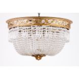 A chandelier Bronze structure with carved and gilt wood finials and cut glass pendants France,