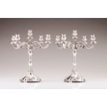 A pair of five-light candelabra Portuguese silver Scalloped and fluted bases, baluster stems and