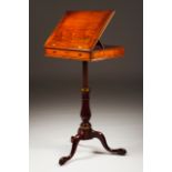 A George III tripod working table Mahogany Adjustable titable top One drawer with several