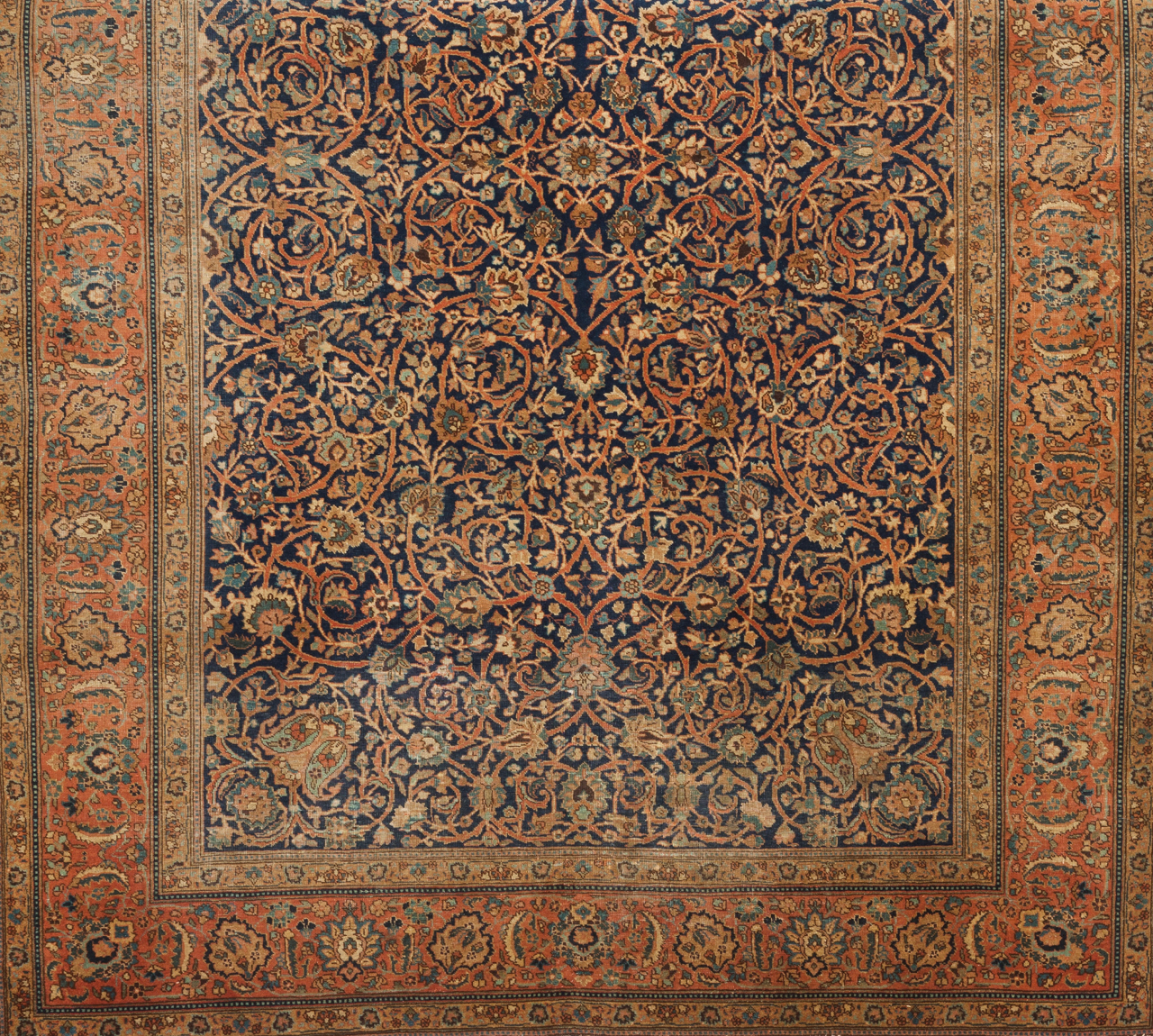 A Tabriz carpet, Iran Cotton and wool Geometric and floral decoration in beige, salmon and brown