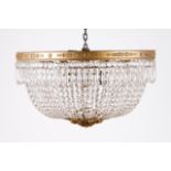 A chandelier Gilt bronze structure with molded decoration Gilt bronze and carved wood finial With