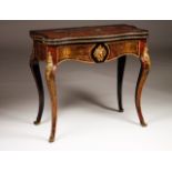 A Napoleon III card table in the Boulle manner Ebonized wood Tortoiseshell and brass inlaid