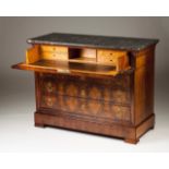 A Louis Philippe bureau-commode Mahogany and burr-mahogany With three drawers Marble top Gilt bronze