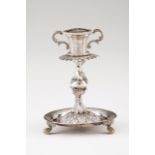 A Romantic toothpick holder Portuguese silver of the 19th century Round base decorated in relief,