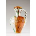 Ewer with cover Portuguese faience Polychrome decoration with brown and green glazing Floral