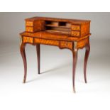 A Louis XV style ladies bureau Rosewood and thornbush marquetry decoration With six drawers Gilt