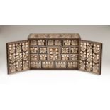 A Mogul cabinet Sissoo with profuse ivory decoration depicting floral motifs Two side doors and