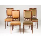 A set of four Empire style armchairs Mahogany Brass mounts depicting mythological figures,