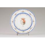 A scalloped plate Chinese export porcelain Polychrome and gilt decoration depicting coat-of-arms