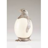 A Penguin, MANUEL ALCINO A Portuguese silver and ostrich egg sculpture representing a penguin