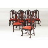 A set of six D. José style chairs Rosewood Two armchairs Decorated with carvings Red upholstery