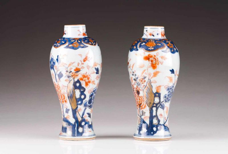 A pair of vases Chinese export porcelain Polychrome Imari decoration depicting garden views with
