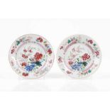 A pair of plates Chinese export porcelain Polychrome Famille Rose decoration with floral motifs and