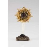 A Reliquary An (approx. 18kt) gold reliquary front designed as a sunburst with Crown of thorns, set