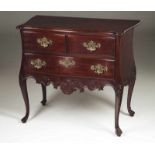A D. José commode Rosewood With two short and one long drawers Carved apron Brass mounts Portugal,