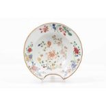 A basin Chinese export porcelain Polychrome Famille Rose and gilt decoration depicting floral