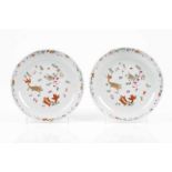 A pair of saucers Chinese export porcelain Polychrome Famille Rose decoration depicting carps and