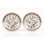 A pair of plates Chinese export porcelain Polychrome Famille Verte decoration depicting branch with